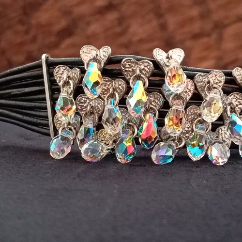 Leather women's bracelet with decorative hearts and rhinestones like new