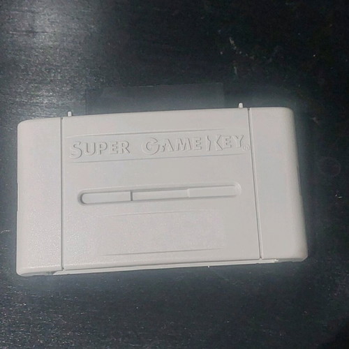 Super Game Key adapter for Super Nintendo like new, region unlock