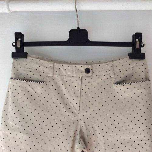 Women's pants like new, low-rise, elastic fabric, size 40, black and beige
