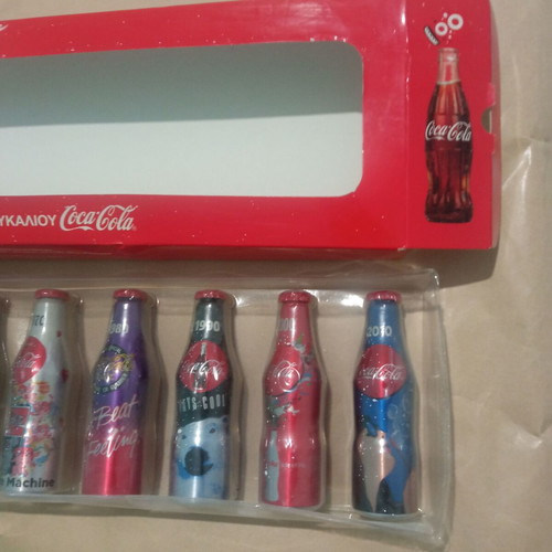 Coca-Cola Mini Bottles 100 Years Collectible Set like new