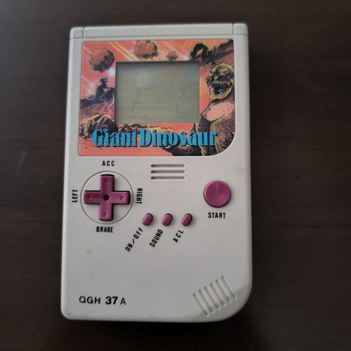 Vintage LCD handheld game "Giant Dinosaur" QGH 37 A (90s retro)
