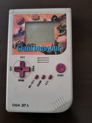 Vintage LCD handheld game "Giant Dinosaur" QGH 37 A (90s retro)