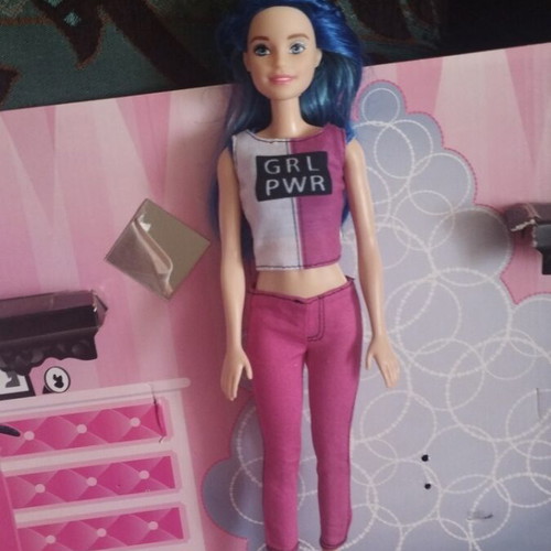 Barbie doll with blue hair