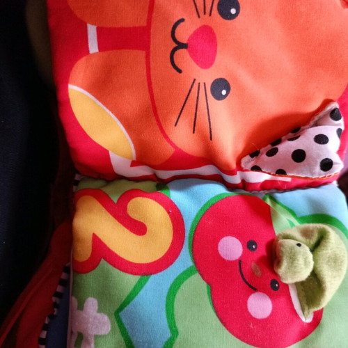 Cow toy for stroller or vintage rattle with sounds and textures