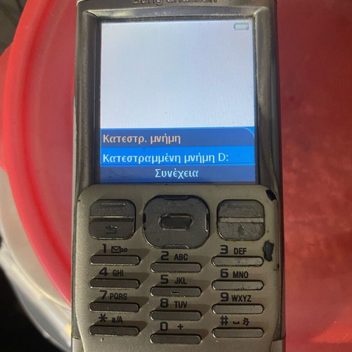 Sony Ericsson P 990i vintage mobile phone used with dock and charger