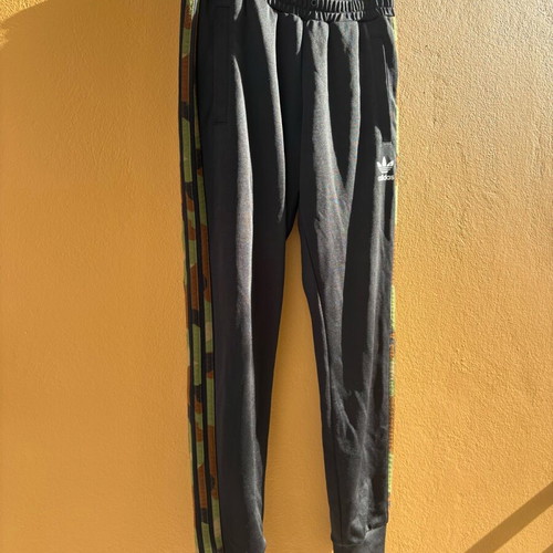 Adidas Originals women's black sweatpants with camouflage stripes like new