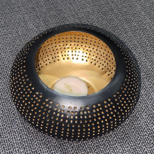 Metal tealight candle holder used black-gold with perforated design