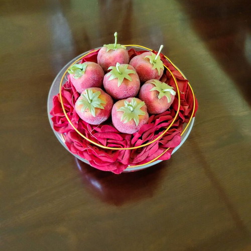 Decorative glass bowl centerpiece with red roses and velvet fruits like new