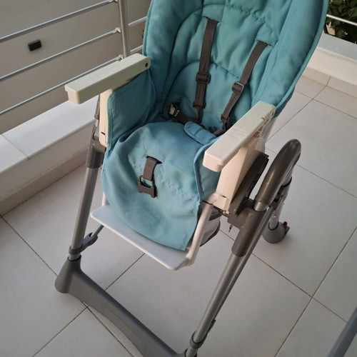 Prenatal high chair used, blue with rear wheels