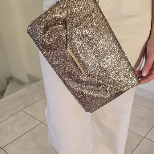 Clutch bag with subtle gold shimmer, like new