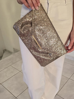 Clutch bag with subtle gold shimmer, like new