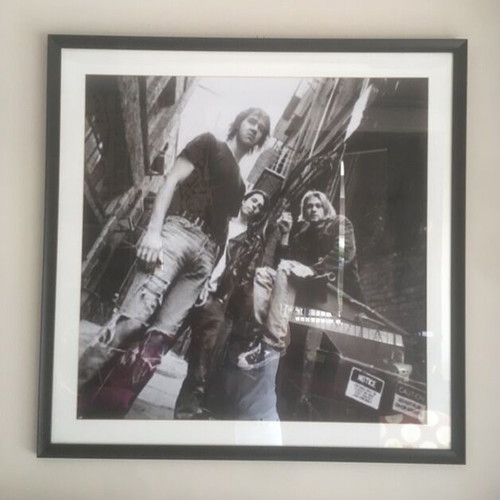 Nirvana collectible art print with wooden frame and glass