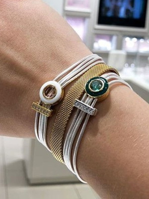 Pandora s925Ale Reflexions bracelet with four strands.
