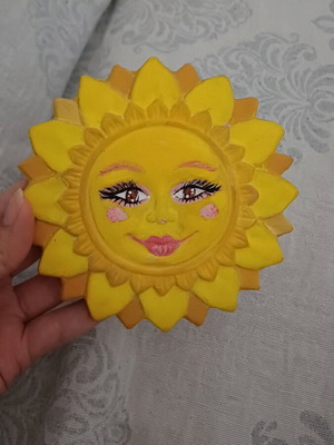 Handmade sun decoration made of clay