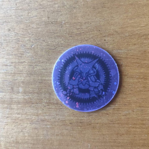 Pokemon Alakazam coin used in very good condition