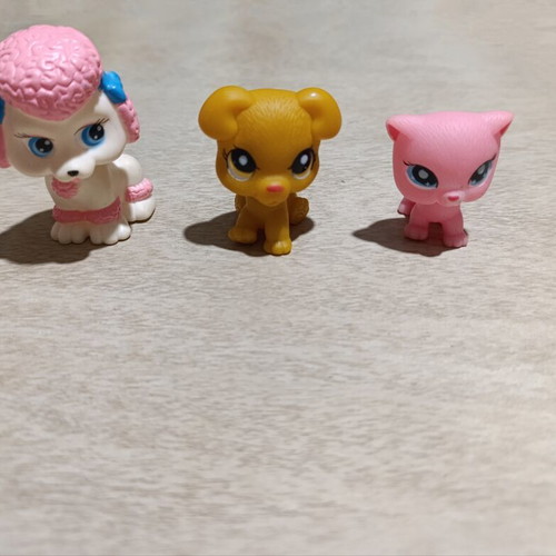 Set of 3 animal figures used, including squishy heads, Barbie collection