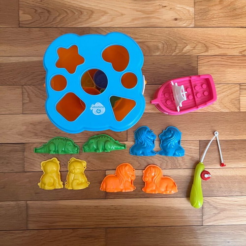 Beach bucket with shape sorting toy used