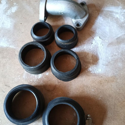Carburetor neck, couplings and 2 used gears