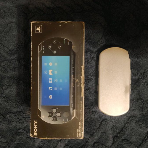 Sony PSP 1004 like new with original charger, case and cover