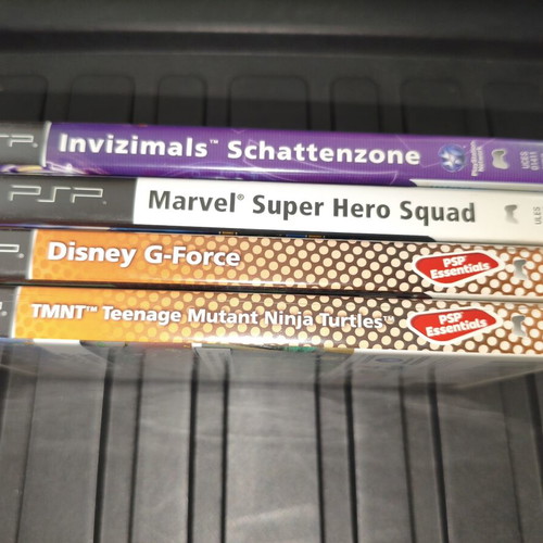 PSP games used including Invizimals, Marvel Super Hero Squad, G-Force, TMNT