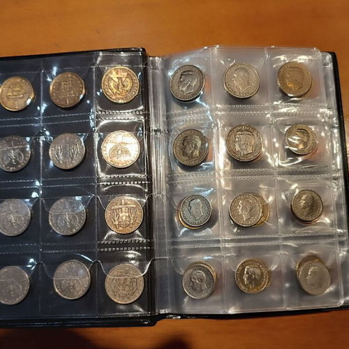 Album of 120 collectible coins from 7 countries