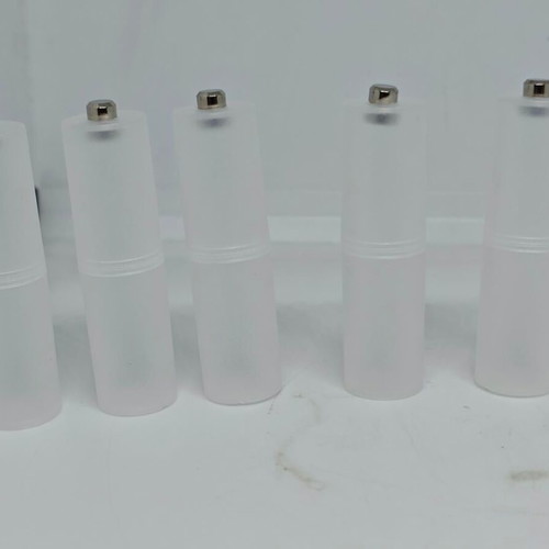 Battery adapters AA to C set of 8, like new, plastic transparent