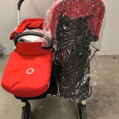 Bugaboo Donkey 2 Twin stroller used with full extra pack black red