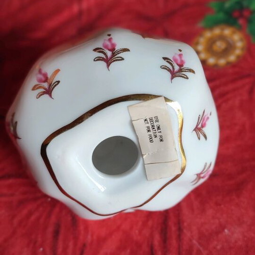 Porcelain pomegranate charm like new with gold leaf detail