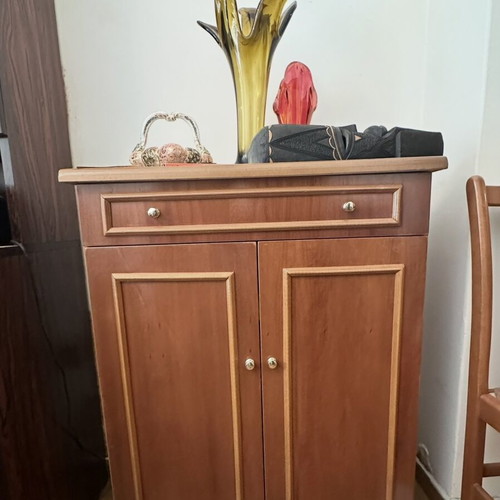 Small wooden cabinet with drawer
