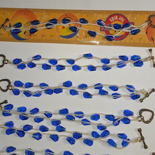 Handmade bracelets pack of 16 with glass beads, white and light ecru thread