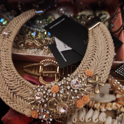 Beige gold straw-style woven necklace with rhinestones