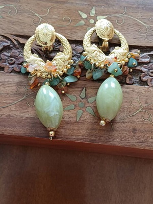 Dangling earrings used with colorful stones