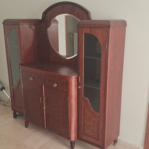 Large wooden antique sideboard with glass cabinets and mirror