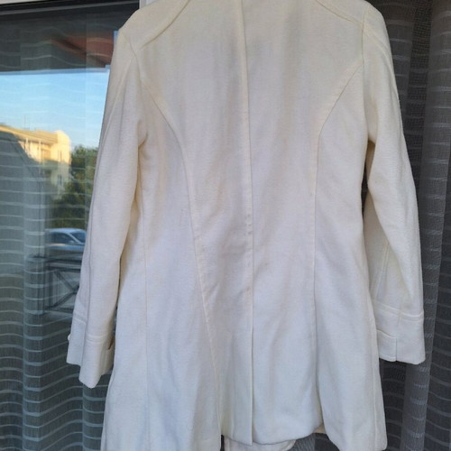 Peacocks white coat medium like new