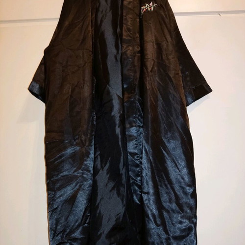 2 women's robes like new, one cream and one black with flower detail
