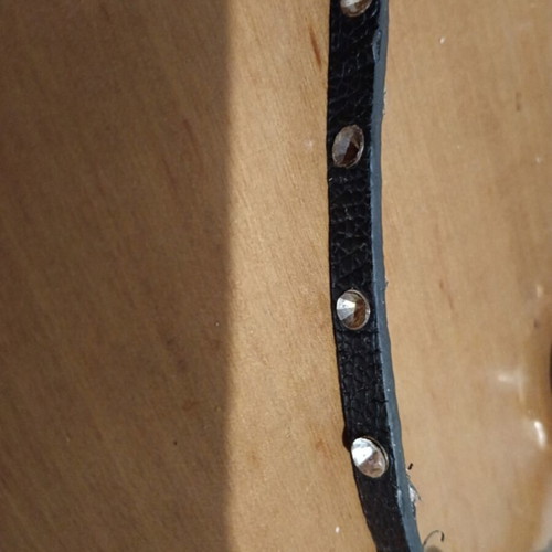Women's watch with leather strap and bow used, black and gold