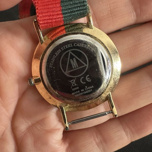 Fashion watch with gold case and NATO fabric strap