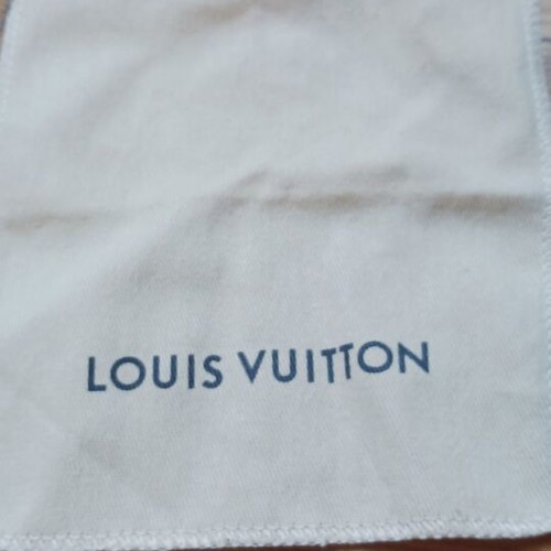 Louis Vuitton metal bracelet like new, gold and silver