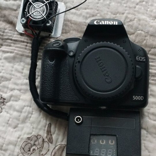 Canon EOS 500D DSLR camera used, modified for astrophotography with cooling