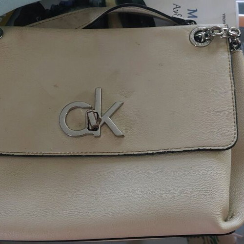 CK shoulder bag made of recycled materials with slight wear