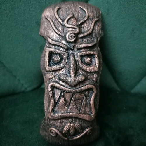 Handmade gypsum magnets and hanging totems painted with acrylics