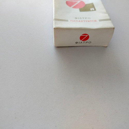 Empty No7 Papastratos cigarette pack used, soft pack