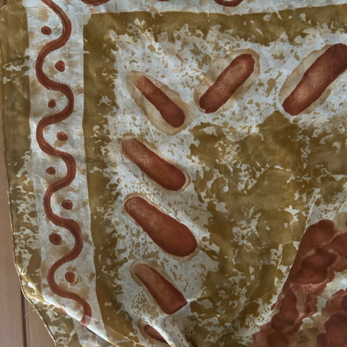 Scarf with patterns like new, beige and brown