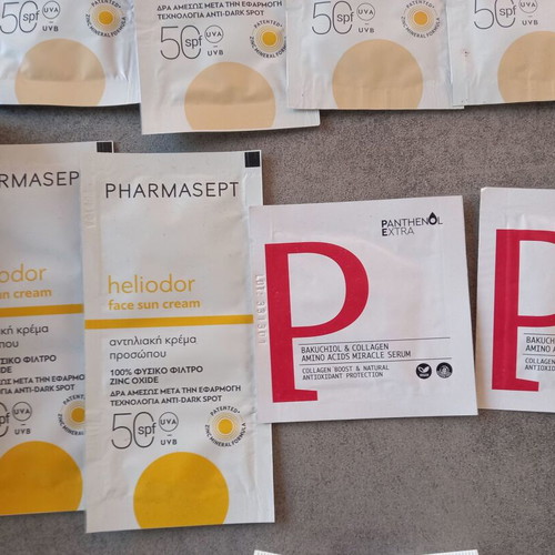 Makeup bag with new sunscreen samples CeraVe Pharmasept Heliocare