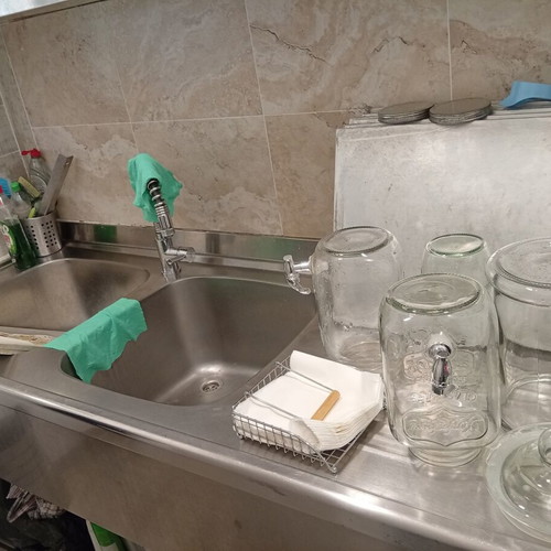 Professional stainless steel counter with 2 sinks used
