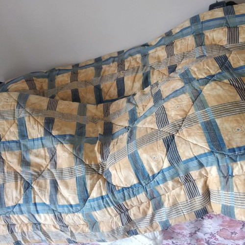 Double quilt used, thick, cream-blue with modern patterns