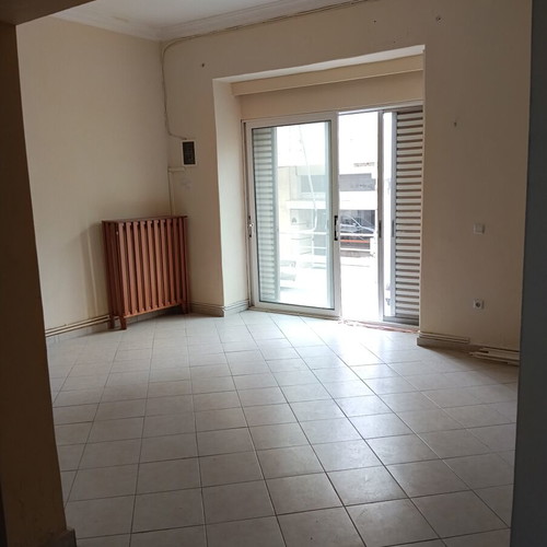 Multipurpose building with apartment and commercial space, Galatsi