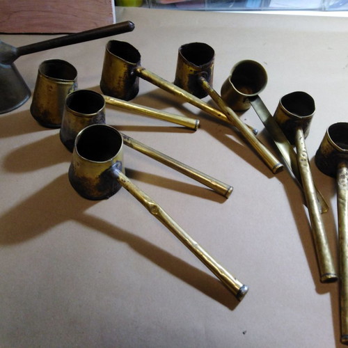 Brikia used, set of eight and four copper pieces