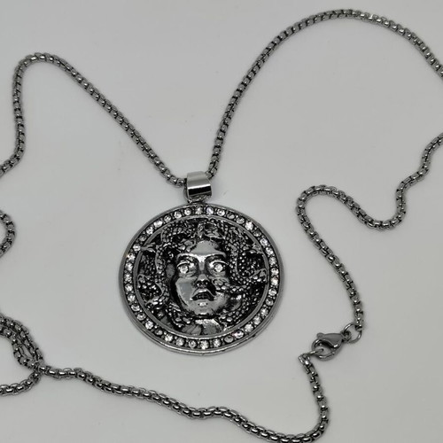 Medusa Pendant in Steel like new with rhinestones and chain