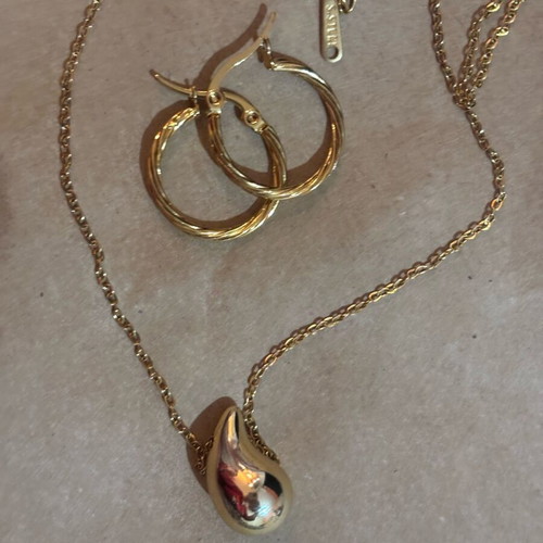 Set of 2 gold jewelry new made of steel